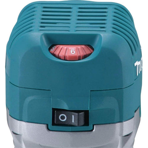 Front view of Makita RT0701C compact router, showing variable speed dial for 10,000 to 30,000 RPM and power switch.