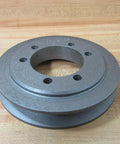 Compact SDS pulley with 5 inch outer diameter and 2-1/8 inch bore for power transmission, shown on wooden surface