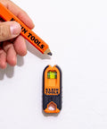 Compact Magnetic Stud Finder And Level With Bubble Vial for wood and metal detection shown on drywall surface.