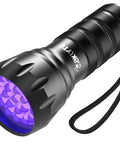 High power compact UV flashlight with 21 LEDs at 395 nm delivers bright fluorescence for urine and stain detection, portable design shown.