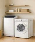Two in one space saving washer and dryer combo that handles up to 17.8 lb wash and 10.6 lb dry, installed in a small laundry space