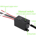 Compact Wireless Relay Remote Switch 12V 5V 12V 48V 10A for Lights & Industrial Control visible with wires and manual switch