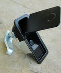 Two piece compression latch with flush sealed lever, lift and turn adjustable grip in black, crafted from steel and zinc alloy