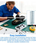 Man installing a battery with tools and a Three Quarter Inch Outer Diameter Compression Spring, Two Inch Length, 0.08 Inch Wire displayed.