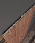 Overhead view of concealed barn door hardware kit with soft close mechanism and invisible wall mount aluminum track installed.