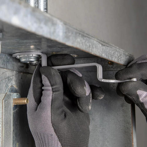 Using Conduit Locknut Wrench Set With Opposing Offset Bends For Tight Spaces One Half Inch, Three Quarter Inch, And One Inch Sizes Three Piece Magnetic Storage Patent Pending to tighten a locknut in a tight space