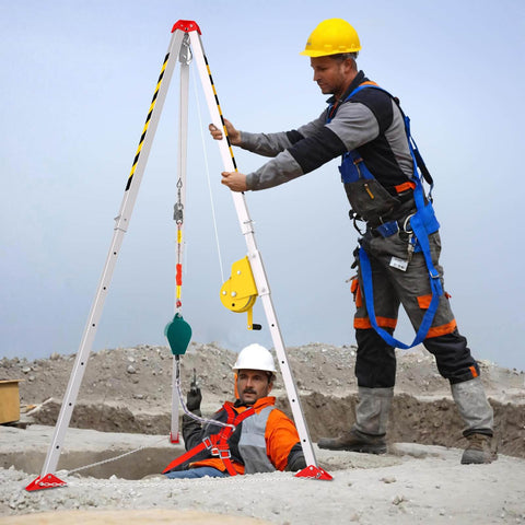 Confined Space Rescue Tripod Kit With 2600lbs Winch in use above a well, featuring 7-foot adjustable tripod and steel cable for emergency rescue.
