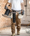 Person wearing leather tool belt with Welding Rod Holder Bundle For Arc Welding, 16 Inch Flame Resistant Leather Electrode Bag With Clip.