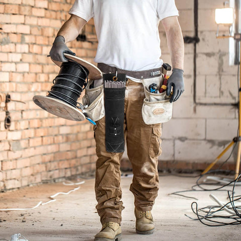 Person wearing leather tool belt with Welding Rod Holder Bundle For Arc Welding, 16 Inch Flame Resistant Leather Electrode Bag With Clip.
