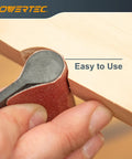 Close-up of Flexible Contour Sanding Set With 3 Foam Pad Thicknesses And 6 Grip Sanding Pads For Contours And Curves in use on wood edge