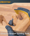 Flexible Contour Sanding Set With 3 Foam Pad Thicknesses And 6 Grip Sanding Pads shaping intricate wood piece.