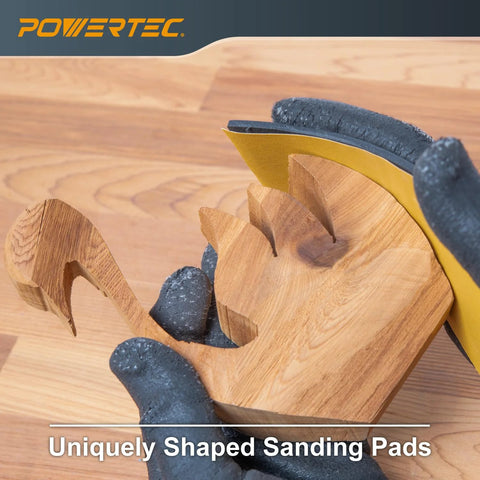 Flexible Contour Sanding Set With 3 Foam Pad Thicknesses And 6 Grip Sanding Pads shaping intricate wood piece.