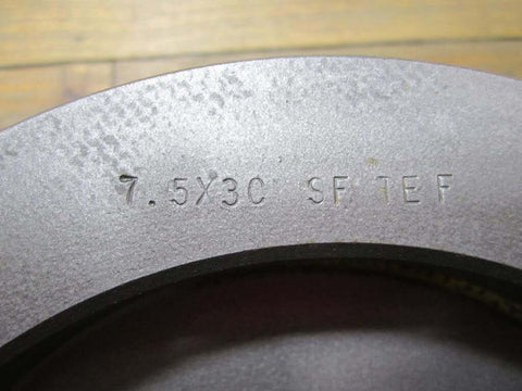 Close-up of a TB Wood's 753C style Conveyor Sheave 7.5X3C SF For Classical CB Bushing with through bore, showing part number engraving.