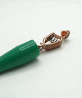 Close-up of copper clip from Portable Grounding Rod With 4 Ft Flexible Copper Bonding Wire for electrical panels and vehicles.
