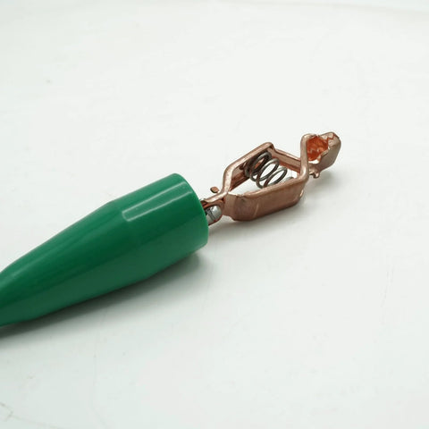 Close-up of copper clip from Portable Grounding Rod With 4 Ft Flexible Copper Bonding Wire for electrical panels and vehicles.