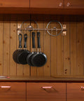 Kitchen Utensil Holder Hanger, Pot and Pan Rack Wall Mount with pans hanging, stainless steel antique copper rail installed on wood wall.
