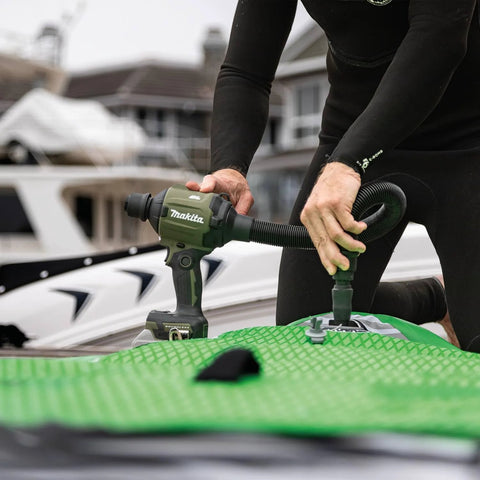 Person using Outdoor Adventure 18V LXT Brushless Cordless High Speed Blower and Inflator Tool Only With 447 MPH Max Air 39 CFM