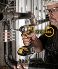 Worker using 20V Max Cordless Drill And Impact Driver Combo Kit With Two Batteries And Charger on pipe installation job