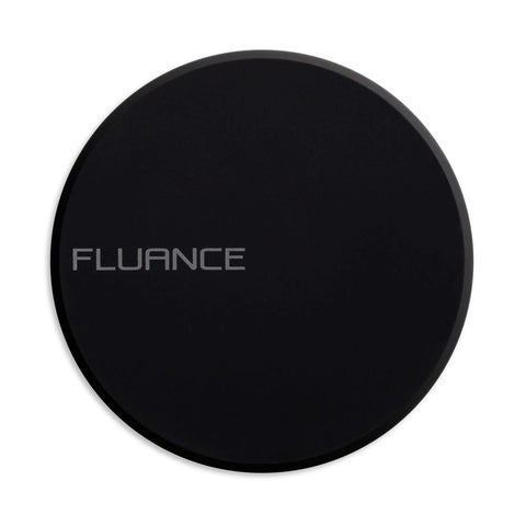 Improve vinyl sound and reduce surface wobble with a cork platter mat and a 760 gram steel weight, securing the record to the platter.