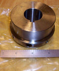 Omega Series Coupling Hub Built Tough For One Eighth Inch Bore And Two And Three Quarter Inch Hub Outside Diameter 7300315 on table