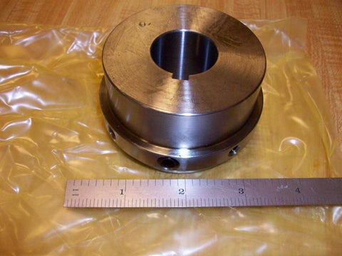 Omega Series Coupling Hub Built Tough For One Eighth Inch Bore And Two And Three Quarter Inch Hub Outside Diameter 7300315 on table