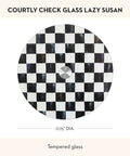 Mackenzie-Childs Glass Lazy Susan 360 Degree Rotating Serving Board In Black And White Courtly Check on white background.