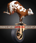 Cow balancing on a caster wheel demonstrating weight capacity, 8 Inch Heavy Duty Casters Set Of 4 With 2 Locking Swivel And 2 Non Locking Swivel 3200 Lbs Capacity Large Solid Rubber Wheels For Workbench Cart Trolley Wagon And Chicken Coop Industrial Plate Mount