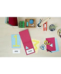 Double Sided Tape For Gift Wrapping And Crafts, 0.50 Inch By 1296 Inch Roll on desk with stationery, globe, and cards