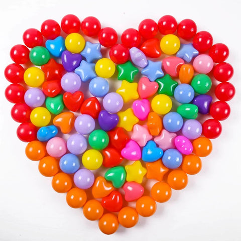 Heart-shaped arrangement of Ball Pit Balls Pack of 100 - Phthalate Free BPA Free Crush Proof Plastic Ball, multicolor shapes visible