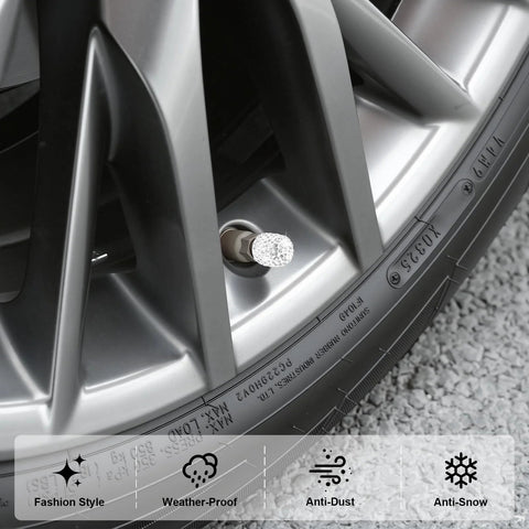 Silver wheel with 4 Pack Handmade Crystal Rhinestone Tire Valve Stem Caps for cars, trucks and motorcycles, close-up view.