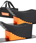 Curved Leveling Blocks For RV And Travel Trailer With A 6 Inch Lift For Easy Tire Change On Tandem Axle Wheels Without A Jack Heavy Duty Up To 35,000 Lbs And 32 Inch Tire Capacity Includes Chocks And Rubber Mat In A 2 Pack, shown with carrying case.