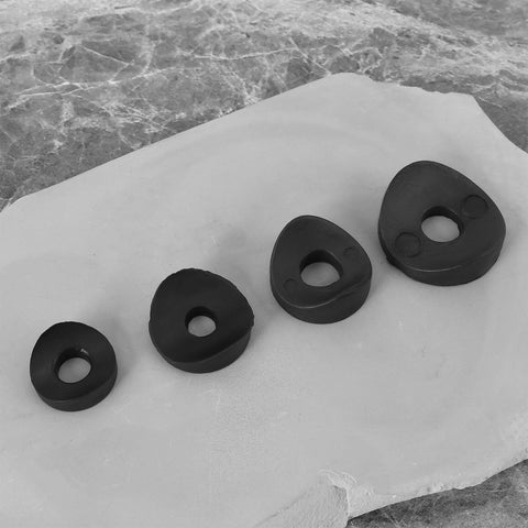 100 Pieces Black Plastic Curved Washers Set For Round Tubes M6 And M8 With PE Spacer Sleeves shown with washers on marble surface