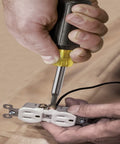 Person using 11 In 1 Screwdriver And Nut Driver Set With 8 Bits Including Phillips Slotted Torx And Square, Cushion Grip Handle on outlet