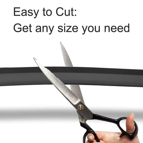 Scissors cutting Magnetic Boundary Strips For Robotic Vacuum Cleaners, 13 Feet Of Tape Markers To Create No Go Zones.