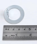Spindle Washer D Shape Set Of 10 For Ez Lube Axles 2K To 7K 1 Inch ID next to a ruler showing size details