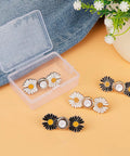 Daisy Flower Jeans Button Tightener For Loose Jeans Adjustable No Sew No Tools Pins Detachable And Reusable Instant Waist Fix Fits Most Jeans 4 Sets By TOOVREN; white and black daisy buttons displayed on a surface.