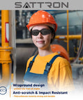 Worker wearing Dark Tinted Safety Glasses 24 Pack ANSI Z87 UV Eye Protection For Construction in industrial setting