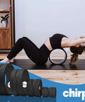 Woman using Density Foam Roller With Built In Spine Channel for Targeted Back And Neck Relief; set of 4, supports up to 500lbs.