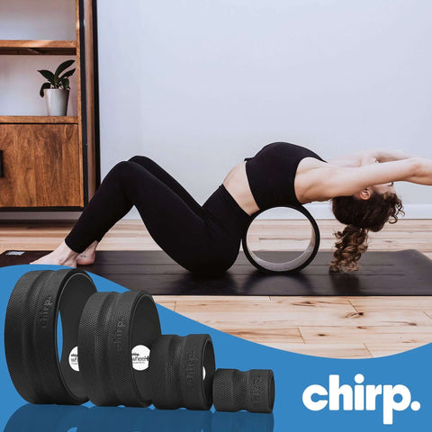 Woman using Density Foam Roller With Built In Spine Channel for Targeted Back And Neck Relief; set of 4, supports up to 500lbs.