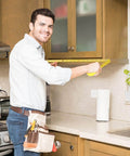 Man using 2 Packs Tape Measure 25 ft /16 ft, Esydon Measuring Tape Extendable, in a kitchen for cabinet measurements