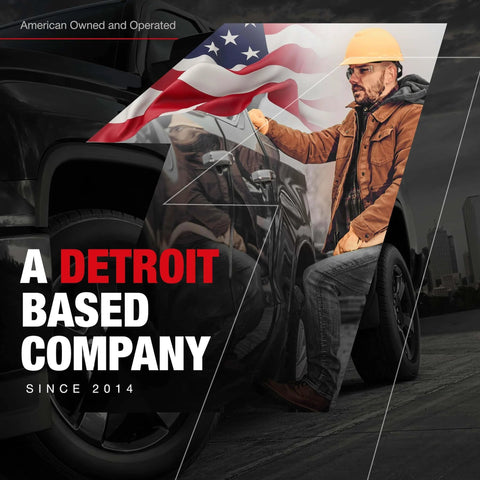 Worker in hard hat with American flag background and truck; text reads 'A Detroit Based Company Since 2014'