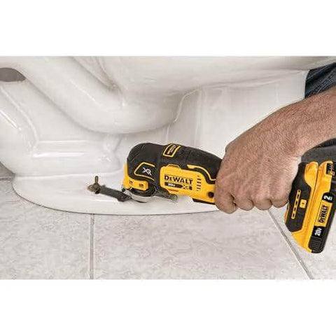Using DEWALT 20V MAX XR Cordless Oscillating Multi Tool with Brushless Motor to cut tile near toilet base