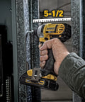 Person using DEWALT 20V MAX cordless drill from the 20V Max Cordless Drill And Impact Driver Combo Kit With Two Batteries And Charger Carry Bag Included Ergonomic Compact And Lightweight Design For Tight Corners And Hard To Reach Spaces Ideal For Home Improvement Projects in tight space.