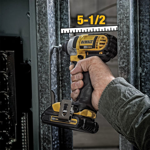 Person using DEWALT 20V MAX cordless drill from the 20V Max Cordless Drill And Impact Driver Combo Kit With Two Batteries And Charger Carry Bag Included Ergonomic Compact And Lightweight Design For Tight Corners And Hard To Reach Spaces Ideal For Home Improvement Projects in tight space.