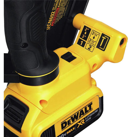 Close-up of DeWalt 20V Max XR cordless framing nailer kit with dual speed control settings, showcasing compact design.