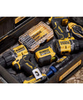 Toolbox containing DEWALT power tools and accessories, featuring a 14 Piece Drill Bit Set With 3 Flats Shank 135 Degree Split Point High Speed Steel For Plastic Wood And Metal.