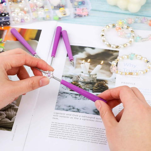 Hands using diamond tipped bead reamer set 4 pcs for DIY jewelry making on magazine with beads, tool enlarging bead holes.