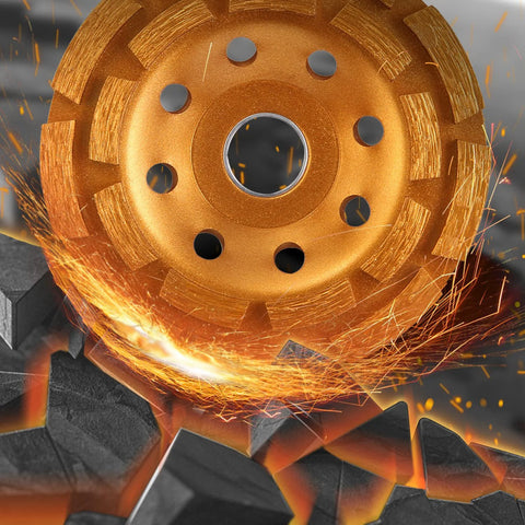 Diamond Concrete Grinding Wheel Four And One Half Inch Double Row Segmented Cup for angle grinder, sparks flying, concrete surface.
