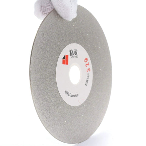 Side view of 4 Inch Diamond Flat Lap Disc 100mm Grit 320 Coated Grinding Disk With Five Eighths Inch Arbor for carving projects