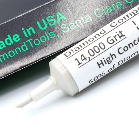 Close-up of USA Made Oil Based Diamond Polishing Compound Paste 14000 Grit 0-1 Microns, syringe tip visible, for precision finishing.